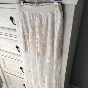 Gorgeous Entro lace skirt with attached shorts. Very flowy.